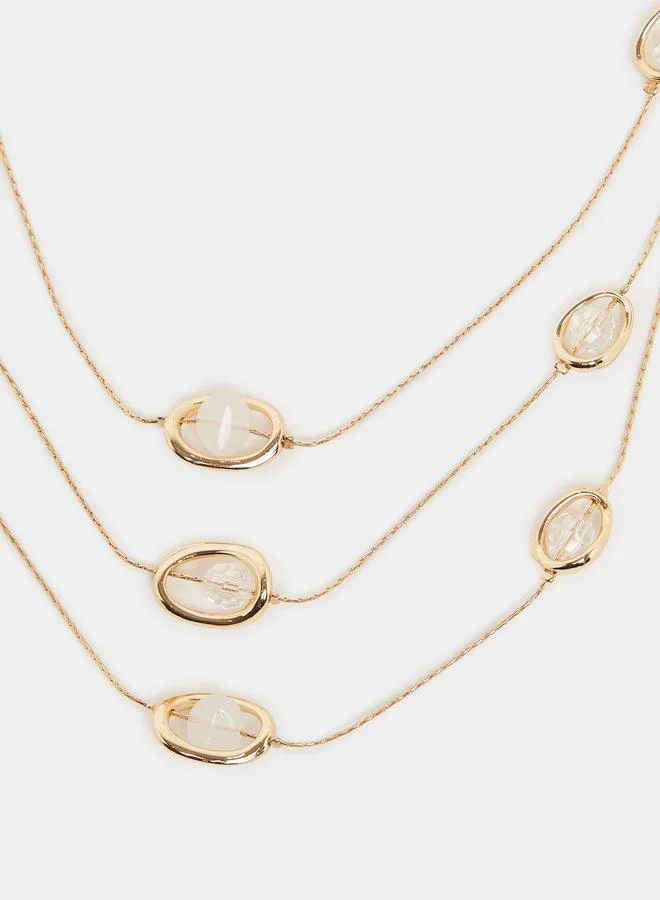 ستايلي عقد متعدد الطبقات بتفاصيل كريستال